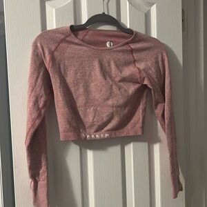 Athletic long sleeve crop top with thumb holes. Size medium